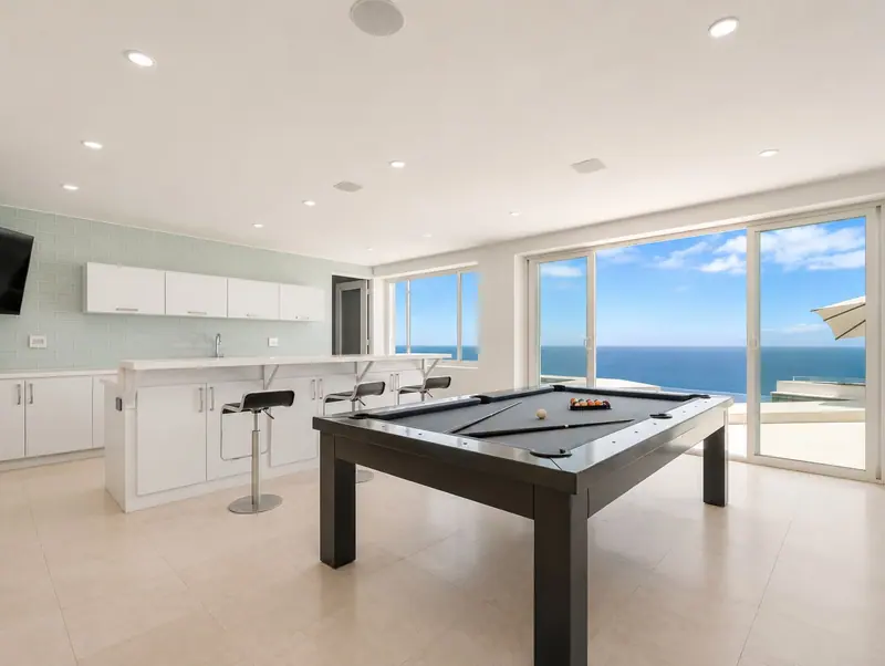Game room pool table and wet bar at Villa Lands End